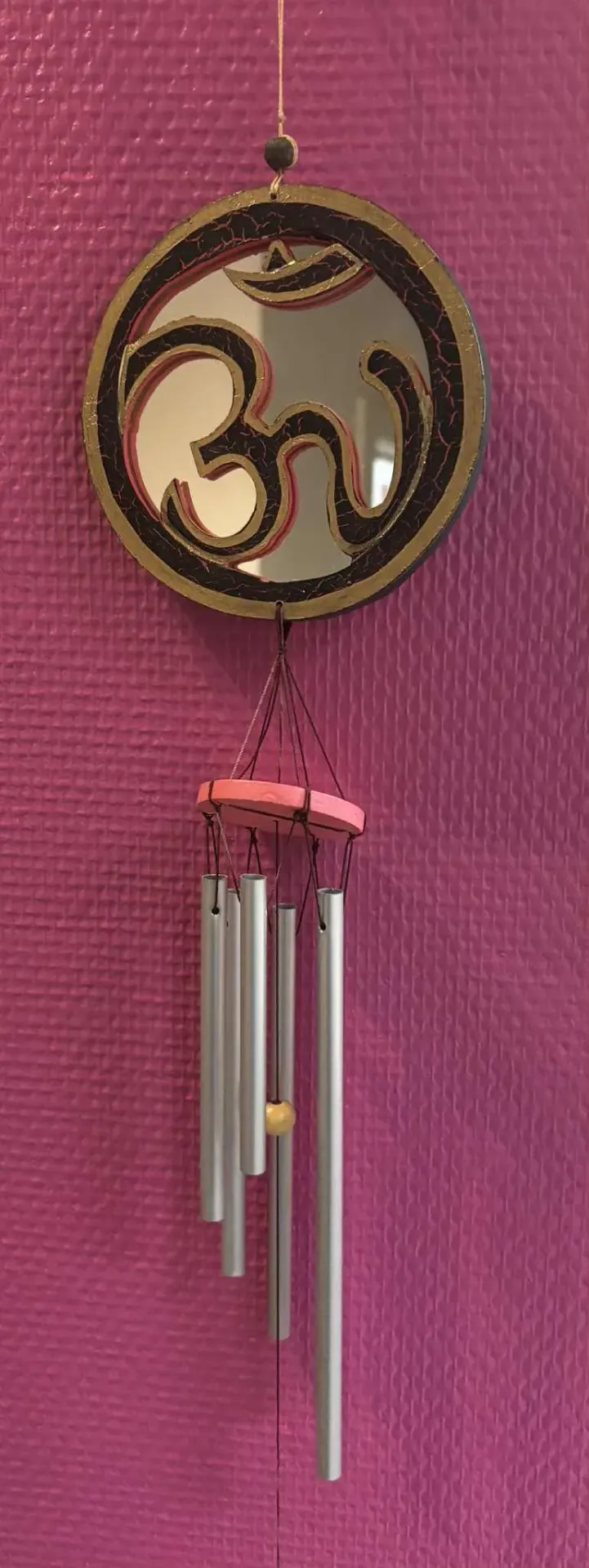 Carillon Om miroir