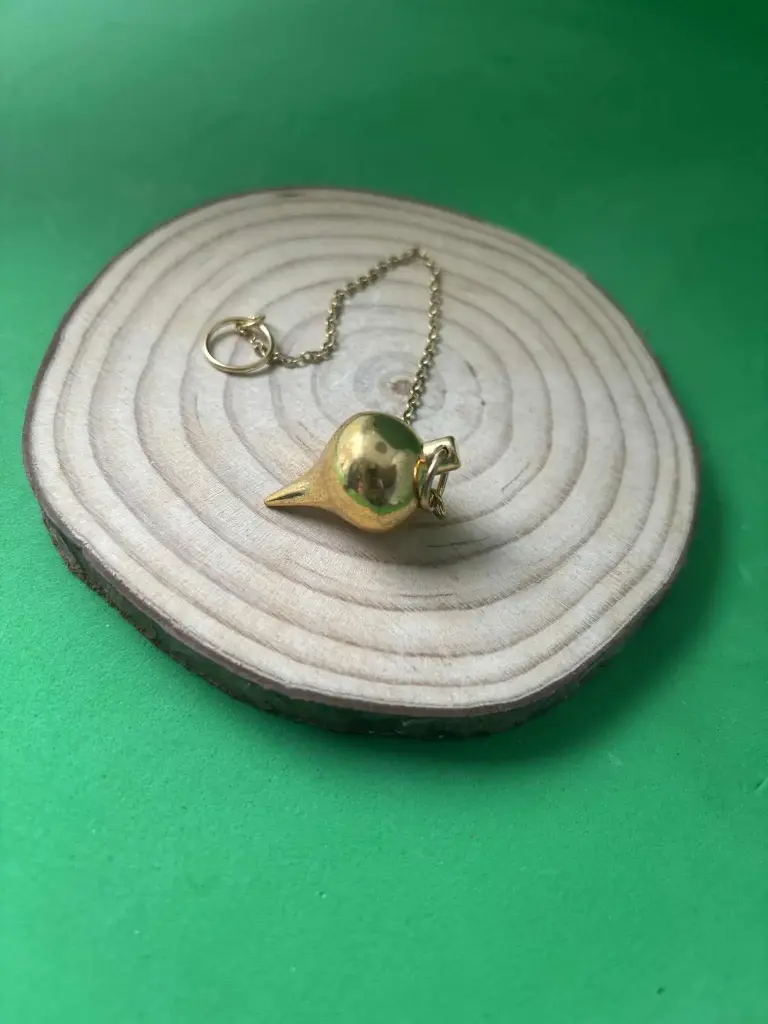 Pendule goutte d'eau doré