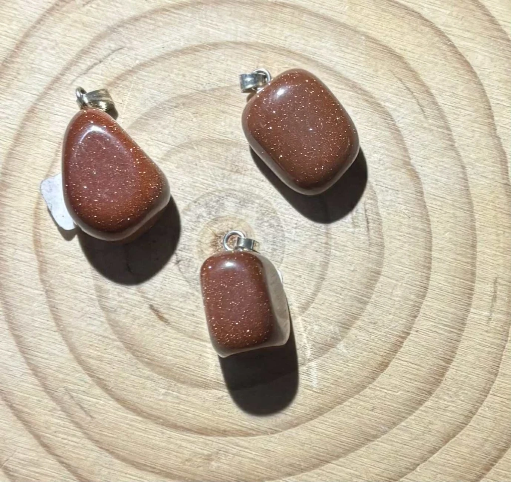 Pendentif Pierre de soleil chauffé