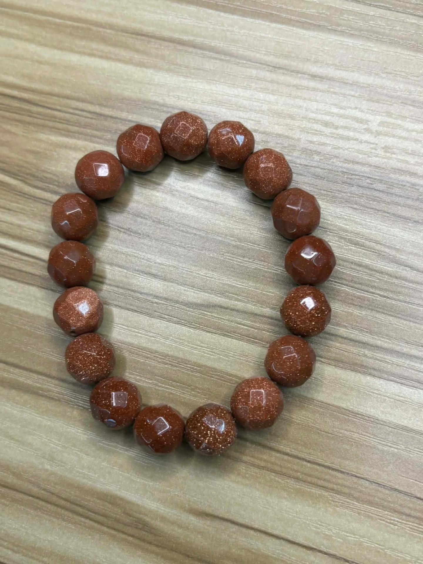 Bracelet Pierre de soleil chauffée facettes 10mm