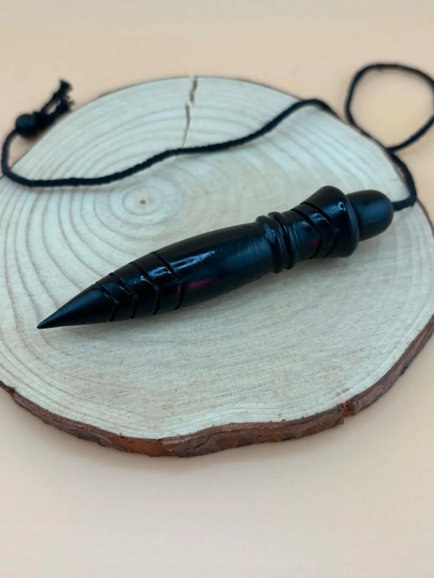 Pendule Thot buis teinté noir plombé